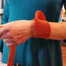 Γυναικείο βραχιόλι πορτοκαλί υφασμάτινο.