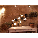 Μεταλλικό φωτιστικό τοίχου για το σαλόνι.