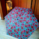 Ομπρέλα τσάντας εμπριμέ θαλασσί με παπαρούνες