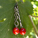 Μακριά σκουλαρίκια με κύκλους και κοκκινωπή ημιπολύτιμη χάντρα