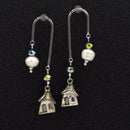 Μακριά σκουλαρίκια ασημί με σπιτάκι.