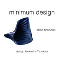 Βραχιόλι χειροποίητο υφασμάτινο μπλε σκούρο.